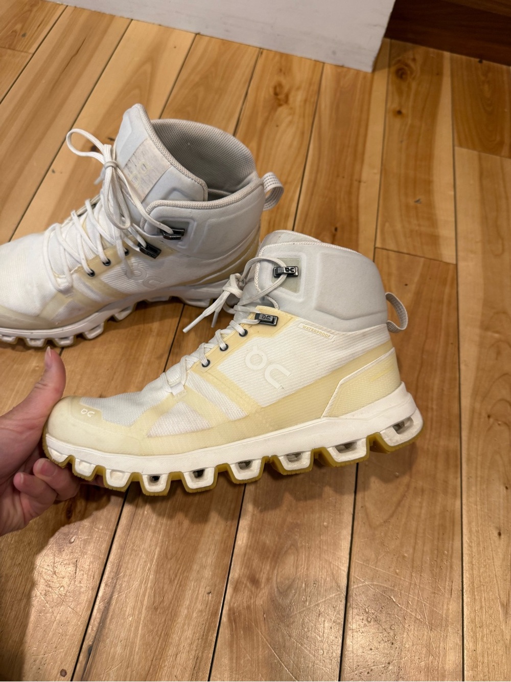 On Running Women's waterproof sneaker Boots in Cream and White